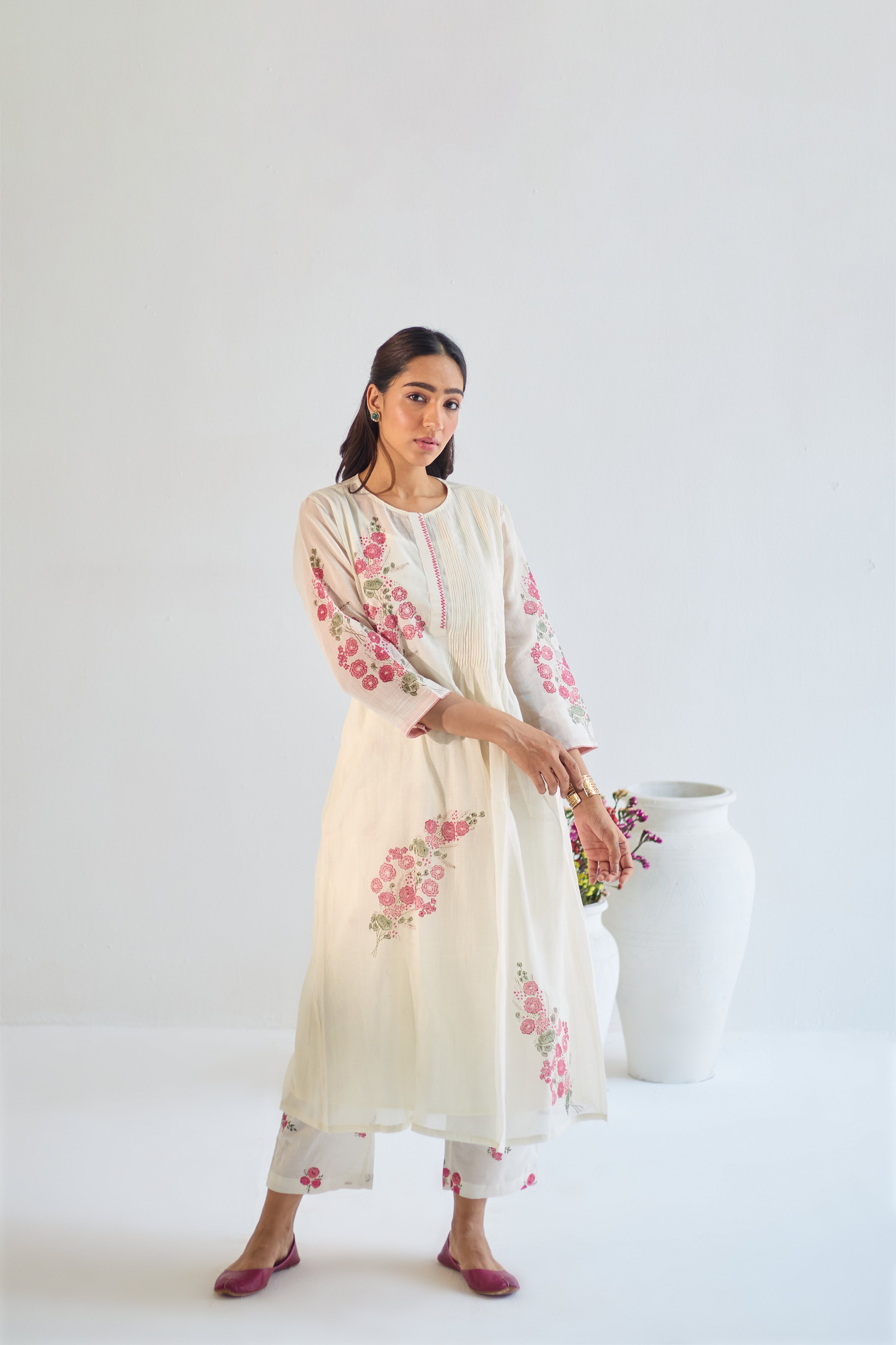 Off white cotton chanderi hand block printed kurta set with all-over Pink & green coloured flower.