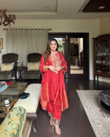 Simran Malik in Rust Orange Rose Mughal Hand Embroidered Short Kurta with Farshi Salwar