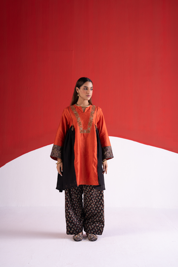Rangrez rust orange kurta with Salwar and dabka embroidery