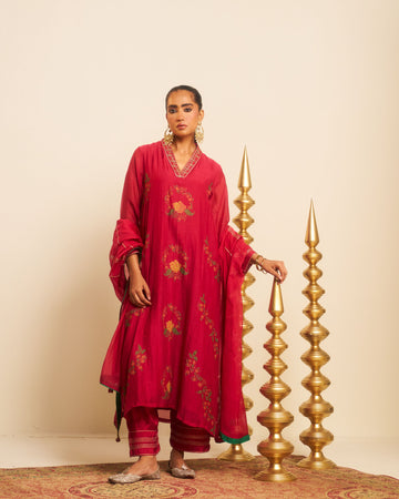 Tehran fuschia hand embroidered and block printed chanderi kalidar kurta set.