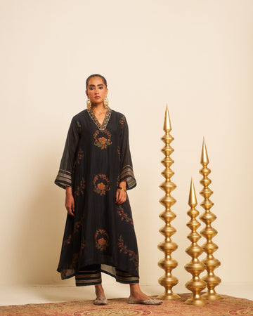 Tehran black hand embroidered and block printed chanderi kalidar kurta set.