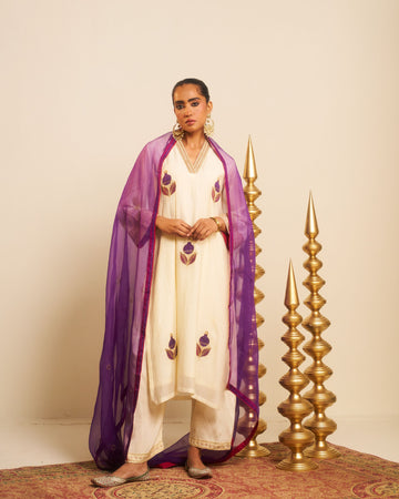 Punica milky white applique hand embroidered chanderi kurta set.
