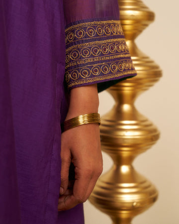Punica purple applique hand embroidered chanderi kurta set.