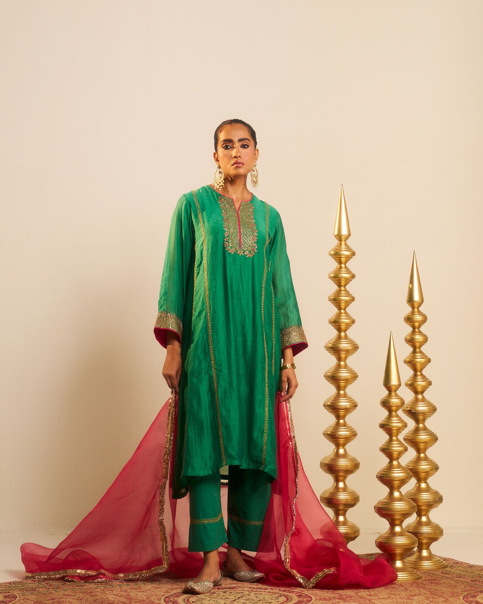 Ibaadat emerald green hand embroidered chanderi kurta set.