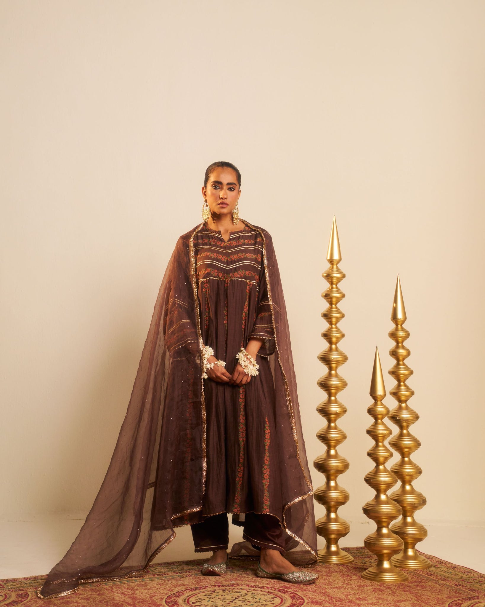 Mehrab brown hand block printed gota work chanderi anarkali kurta set.